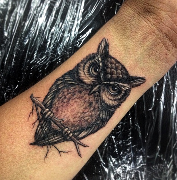 Tatuaje silueta buho