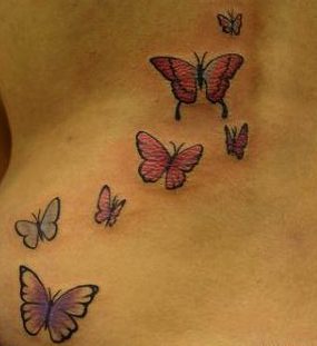 Diseño tribal mariposa espalda
