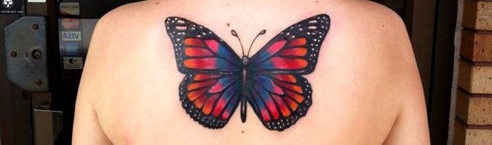 Tatuaje mariposa espalda baja