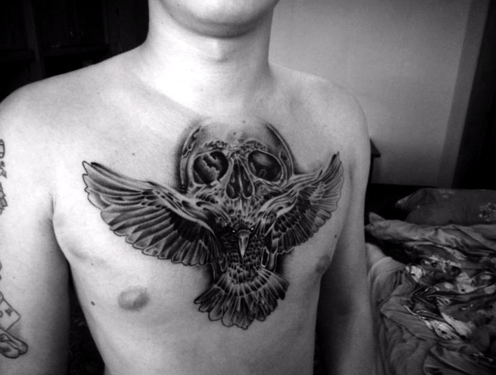 Tattoo calavera y ave