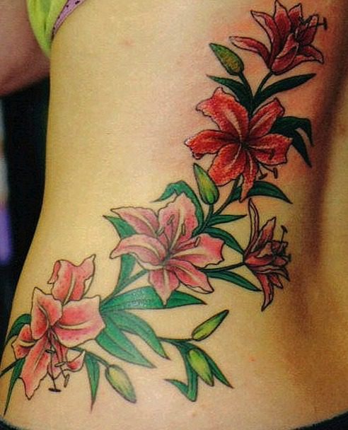 Tatuajes flores espalda mujer