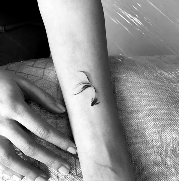 Silueta pez tattoo