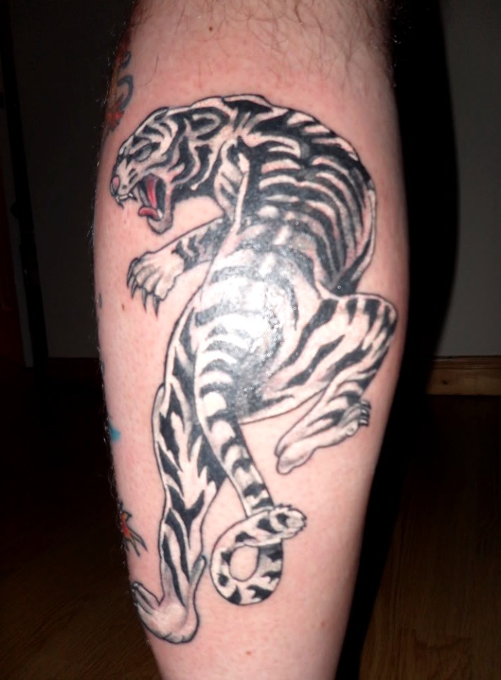 Tattoo tigre blanco ojos azules