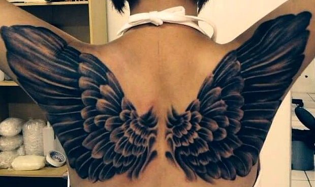 Diseños tatuajes espalda femenina
